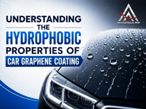 Black luxury car with water droplets showcasing hydrophobic graphene coating effect, featuring Alfashield PPF logo and bold text “Understanding the Hydrophobic Properties of Car Graphene Coating”.